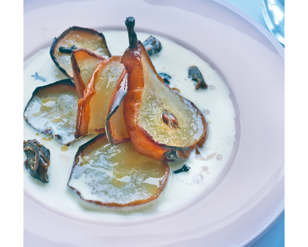 Baked Pears in vanilla cream with dates and cloves photo by Raoul Butler