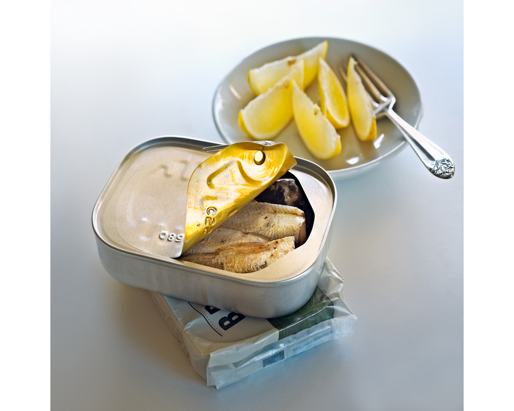 Sardines and a bowl of lemons photo by Raoul Butler