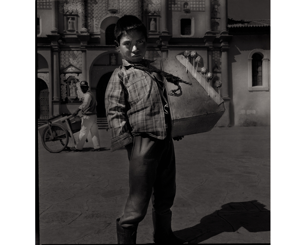 Mexico Boy with lolly pops photo by Raoul Butler